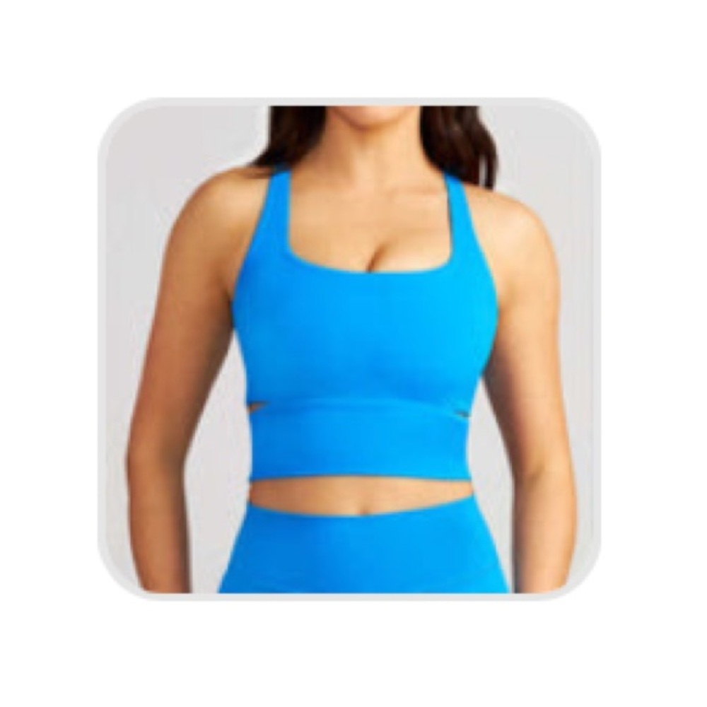 Stori Opposition Long Line Sports Bra in blue sky. Size 10